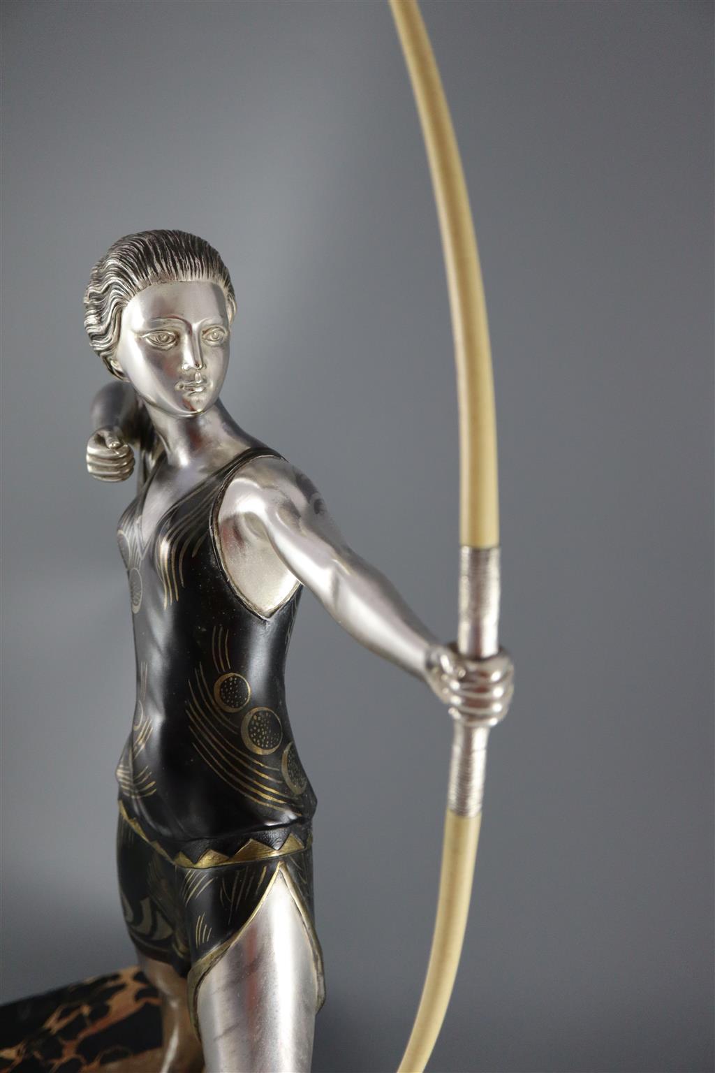 Lucien Gibert (1904-1988) - an Art Deco silvered spelter figure of a female archer, H. 26.5in. W. 22.5in.